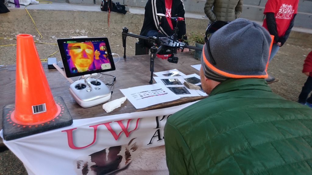 An attendee sees what their face looks like in front of an infrared drone camera